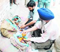 Health Department staff inspect food items at the Amritsar Central Jail.