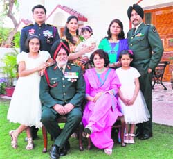 Arjuna awardee Olympian Col Balbir Singh�s fourth generation is serving in the Army. Col Balbir is seen with his son (extreme left) Major Sarfaraz Singh and son-in-law (extreme right) Lt Col Manjot Singh with other family members at a function in Jalandhar