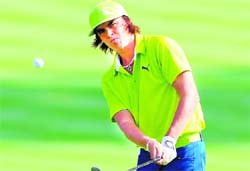 Rickie Fowler in action during the second round of World Golf Championship in Akron on Saturday.