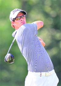 Adam Scott of Australia hits his tee shot during the third round of World Golf Championships in Akron, Ohio on Saturday