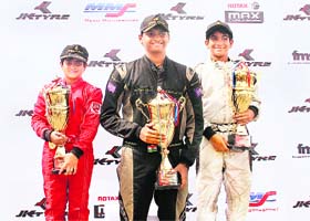 (L to R) Winners Kush Maini, Vishnu Prasad and Jehan Daruvala pose with their trophies on the podium in Hyderabad on Sunday