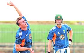 Doug Bollinger (L) & Michael Clarke at a net session on Sunday