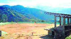 The grassless ground and incomplete pavilion at the sports stadium, Doda. 
