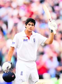 Alastair Cook celebrates reaching his century at Edgbaston on Thursday