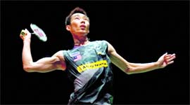 Lee Chong Wei of Malaysia returns to Chen Jin of China at the World Badminton Championships in London on Saturday.