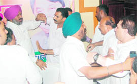 Congress workers in a scuffle at a meeting of the Jalandhar District Congress Committee on Friday. 