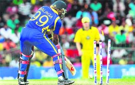 Sri Lanka�s Lasith Malinga is bowled by Brett Lee in Colombo on Saturday.