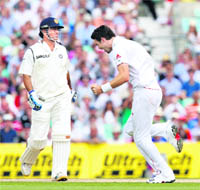 James Anderson (R) celebrates the wicket of MS Dhoni at The Oval in London, on Sunday