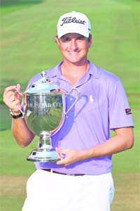 Webb Simpson with the trophy in Greensboro on Sunday