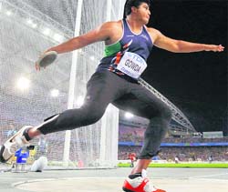 India�s Vikas Gowda competes in the men's discus throw final at the IAAF World Championships in Daegu on Tuesday.� Reuters