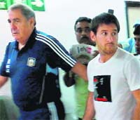 Lionel Messi arriving at the NSCBI Airport in Kolkata on Wednesday. Messi will be playing an exhibition match against Venezuela in the city on Friday.