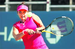 Sania Mirza in action at the US Open. � AFP