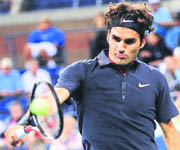 Roger Federer in action against Juan Monaco during the fourth round of the US Open in New York on Monday. Federer won 6-1, 6-2, 6-0. 
