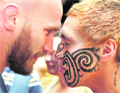 Scotland's Ally Strokosch (L) exchanges a hongi (traditional Maori greeting) with a local at Invercargill on Wednesday, ahead of the Rugby World Cup which starts on September 9