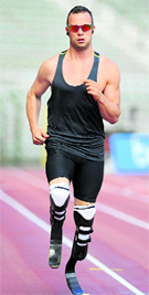 Oscar Pistorius runs on the track during a training session ahead of the Memorial Van Damme meet, part of the IAAF Diamond League, in Brussels on Tuesday