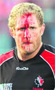 Canada's Pat Riordan bleeds during the match against Tonga in Auckland