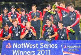 England players celebrate after winning the ODI series against India in Cardiff on Friday