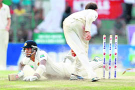 A Mathews dives to complete a run in Colombo on Sunday.