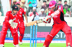 Ruhuna�s Chandimal (R) in action on Monday. 