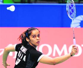 Saina Nehwal eyes a return against Fu Mingtian duirng their singles second round at the Japan Open in Tokyo on Thursday