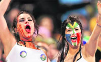 Fans celebrate in the stands during the Rugby World Cup in Dunedin
