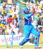 Kieron Pollard is bowled by Patrick Cummins in Chennai on Sunday