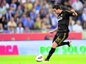 Real Madrid's forward Gonzalo Higuain shoots during the Spanish league match against RCD Espanyol at the Cornella-El Prat stadium in Cornella on Sunday.