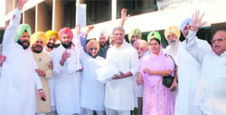 Congress leaders raise slogans outside the Vidhan Sabha in Chandigarh