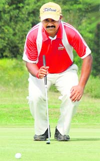 A golfer in action during the Haryana Open at the Panchkula Golf Club on Wednesday