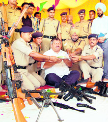 CRPF personnel in Amritsar worship their weapons on the occasion of Dasehra