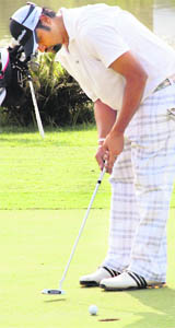 Rajiv in action during the Haryana Open golf tournament at the Panchkula Golf Club on Thursday. 