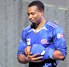 Kieron Pollard of MI leaves after getting injured during a practice session in Chennai on Thursday. � PTI