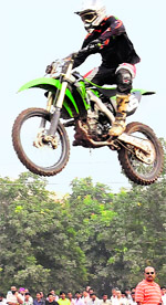 A driver performs a jump on the track in Chandigarh on Friday. 