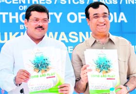 Union Minister for Social Justices and Empowerment Mukul Wasnik (L) and Union Sports Minister Ajay Maken during the launch of 'Come and Play Scheme' at the National Stadium in New Delhi on Sunday