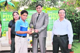 Yuvraj receiving the prize in Chandigarh on Sunday