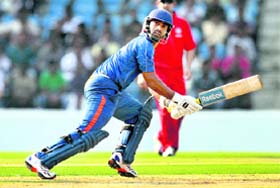 Dinesh Karthik of India Blue in action against India Red in the NKP Salve Challenger Trophy in Nagpur on Monday