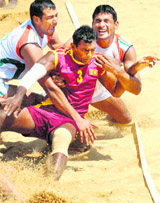 Sri Lankan and Indian teams in action during the Kabaddi semifinals of The South Asian Beach Games in Hambantota on Tuesday.