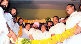 Punjab Pradesh Congress Committee chief Capt Amarinder Singh being honoured by the Dalit Mahapanchayat in Ludhiana on Sunday.