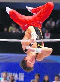 Germany's Philipp Boy falls from the horizontal bar during the apparatus final at Artistic Gymnastics World Championships in Tokyo on Sunday