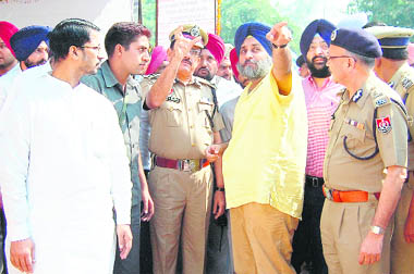 Deputy CM Sukhbir Singh Badal with DGP Anil Kaushik ( on his left) and ADGP SK Sharma in Amritsar on Monday. 