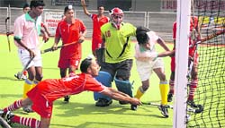 A match in progress between Birsa Munda, Rourkela and Spring Dale Senior School, Amritsar in Jalandhar on Tuesday. 