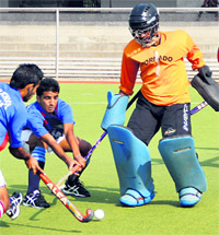 Players in action during the Balwant Kapur Hockey tournament on Thursday