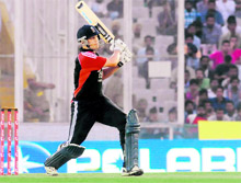 England�s Jonathan Trott plays a shot against India at the PCA Stadium in Mohali on Thursday