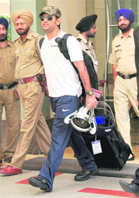 Indian captain MS Dhoni leaves his hotel in Chandigarh on Friday. 