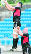 New Zealand�s Ali Williams (L) is lifted by Ben Franks during their training session in Auckland on Saturday. New Zealand will face France during the 2011 Rugby World Cup final to be held on October 23.