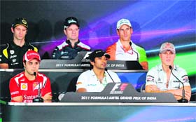 Clockwise from top Left: Team Lotus driver Jarno Trulli, Williams-Cosworth driver Rubens Barrichello, Force India-Mercedes driver Adrian Sutil, Mercedes driver Michael Schumacher, Hispania-Cosworth driver Narain karthikeyan and Ferrari driver Felipe Massa at a press conference in Greater Noida on Thursday
