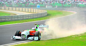 Force India-Mercedes driver Paul di Resta kicks up dirt after negotiating a corner during the qualifying session on Saturday.