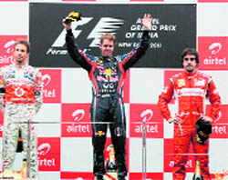 Jenson Button, Sebastian Vettel and Fernando Alonso on the podium on Sunday.