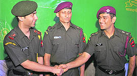 MS Dhoni (R) greets Abhinav Bindra after the two of them were felicitated by the Indian Army with the rank of Lieutenant Colonel on Tuesday.