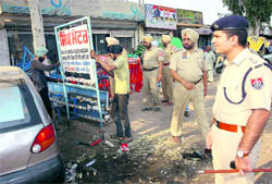 A police team carries out an anti-encroachment drive in Patiala on Wednesday